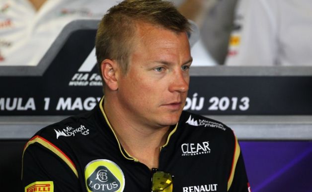 Lotus team boss Eric Boullier and Kimi Raikkonen