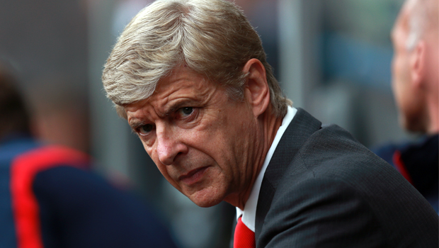 Wenger cools title talk