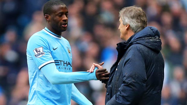 Yaya Toure and Manuel Pellegrini Manchester City