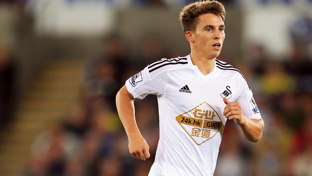 Swansea City midfielder Tom Carroll