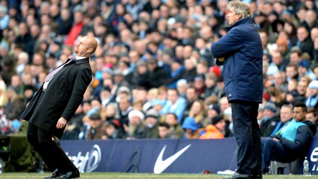 Manchester City Manuel Pellegrini and Burnley Sean Dyche