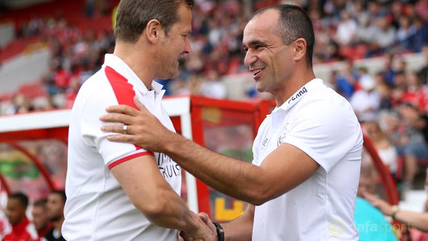 Everton boss Roberto Martinez and Swindon Town manager Mark Cooper