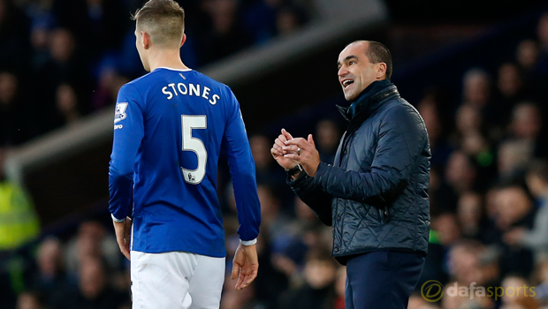 Everton John Stones and Roberto Martinez