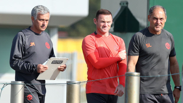 Manchester United manager Jose Mourinho (left) with captain Wayne Rooney during a training session at Aon Training Complex, Manchester