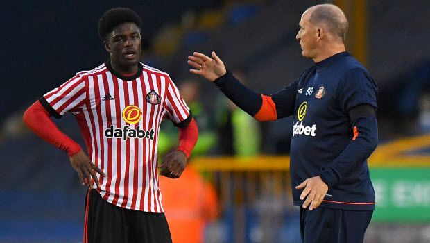 Sunderland Josh Maja (left) speaks with manager Simon Grayson