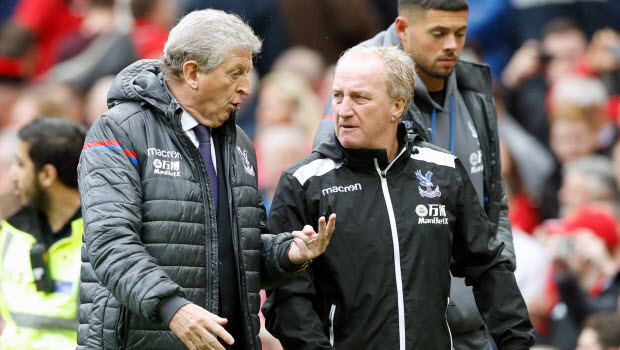 Crystal Palace manager Roy Hodgson (left) speaks to assistant Ray Lewington